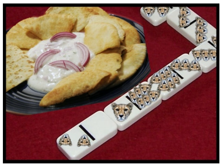 image of dominoes with jungle cats instead of dots, next to a plate of crispy pocket bread and dip